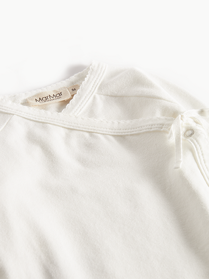 Tut Wrap LS, Modal NOOS